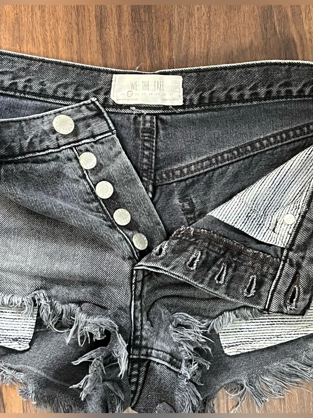 Free People black/charcoal low rise button fly denim cut off mini shorts